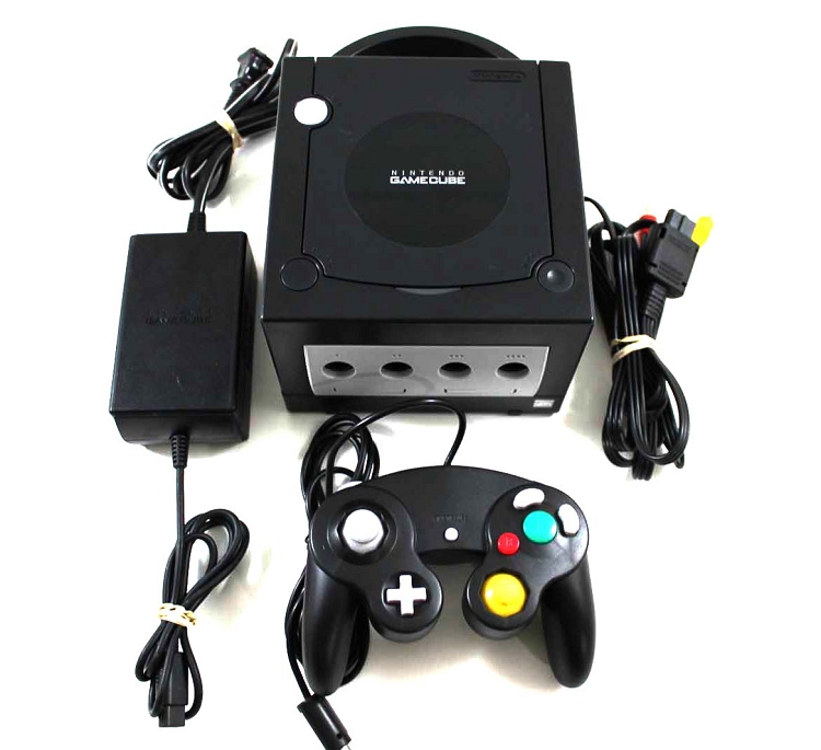 GC: CONSOLE - BLACK - INCL: 1 CTRL; HOOKUPS (COSMETIC DAMAGE) (USED)